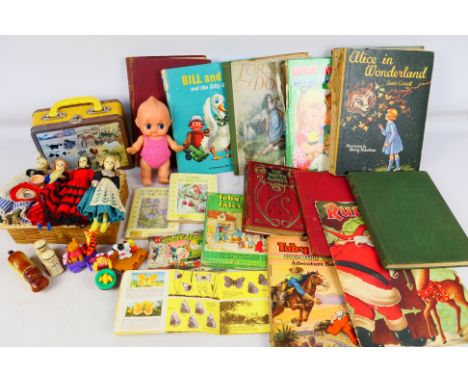 Enid Blyton - Toby Twirl - Rudolph - A group of vintage children's books, vintage dolls and toy figures including Alice In Wo