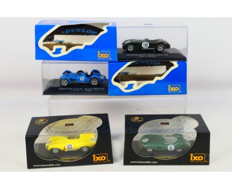 IXO - Four boxed 1:43 scale diecast model cars from IXO, including LM1953 Jaguar XK120C Le Mans winner 1953; LMC049 Aston Mar