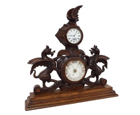 Impressive carved walnut clock/barometer, the 3.5" white clock dial over the 5" white barometer dial fitted with a thermomete