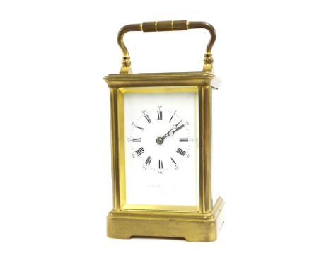 Carriage clock striking on a gong, the dial inscribed Goldsmith & Silversmiths Company, within a corniche brass case, 6.5" hi