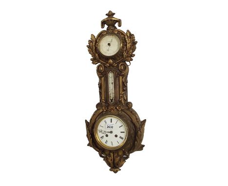 French cast gilt metal cartel wall clock, inset with a barometer signed J Wainwright & Co, over a thermometer and two train m