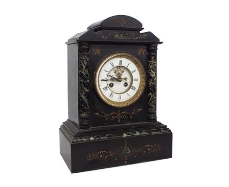 Black slate and green marble two train mantel clock striking on a bell, the 4.5" white chapter ring enclosing a recessed visi