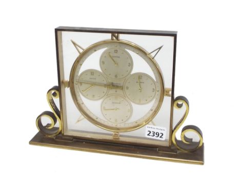 World time multi-dial clock, the 5.75" compass bezel enclosing four individual dials for Central, Eastern, Mountain and Pacif