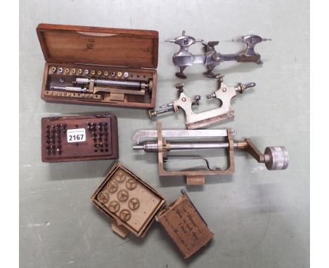 Small selection of sundry tools including a part stake set, boxed set of turns, mainspring winder, pivoting tool, polishing t