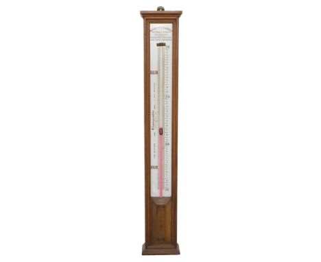 Negretti & Zambra glycerine and mercury long range barometer, within a light oak case, 43.5" high