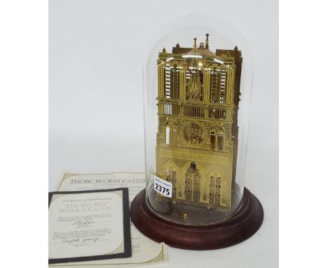 Thwaites & Reed Big Ben replica skeleton clock with passing strike, upon a turned wooden socle under a glass dome, 11.5" high