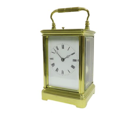French repeater carriage clock striking on a gong, the back plate bearing the trademark logo of Drocourt, the white dial with