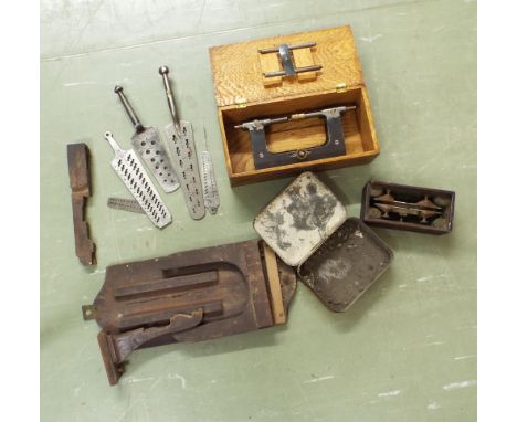 Small collection of boxed and other clockmaker's tools