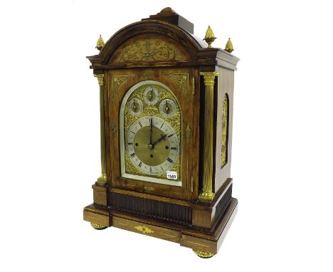 Impressive walnut triple fusee boardroom clock, the substantial movement playing on a nest of eight bells, four gongs and str