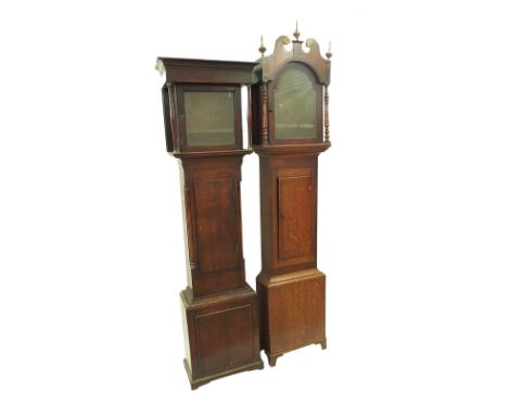 Oak case with aperture for a 12" arched dial, the trunk with short door and surmounted by a swan neck pediment with three tur