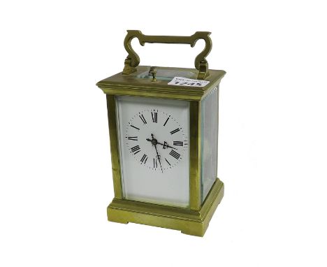 Grand Sonnerie repeater carriage clock striking on two gongs, the white dial within a corniche brass case, 6.75" high