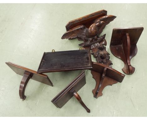 Good large carved wall clock bracket, supported by an eagle with outstretched wings over fruiting vines, 20" high; also five 
