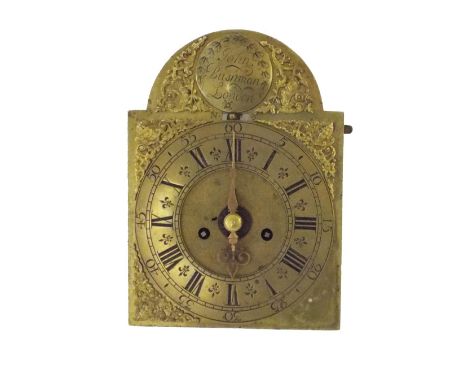 English eight day verge clock movement, the 7" brass arched dial signed John Busham, London on a convex boss to the arch over