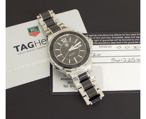 (11 537834-3-A) Tag Heuer Formula 1 black ceramic and diamond lady's bracelet watch, ref. WAH1212, ser. no. EKA2526, quartz, 