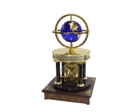 Royal Geographical Society Millennium clock, the gilded blue glass globe orbited by the moon, within two circular brass scale