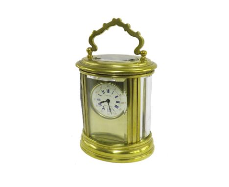 Miniature French oval carriage clock timepiece, the 1" circular dial signed Friedel, Montreux within a gilt mask and oval bra