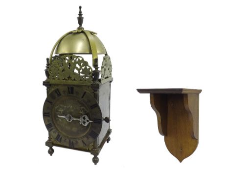 Good quality 17th century style brass verge striking lantern clock, the 6" brass chapter ring enclosing a foliate engraved ce