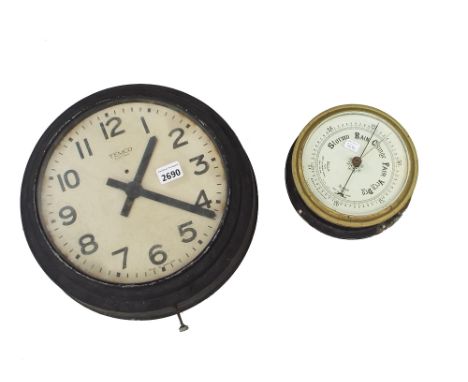 Electric slave dial clock, the 9.5" circular dial signed Temco, Electric within a blackened metal surround; together with a s