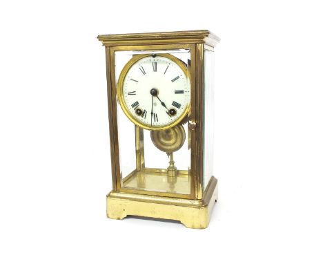 Ansonia two train four glass mantel clock striking on a gong, the 3.75" cream dial within a bevelled glazed stepped brass cas