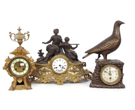 French two train spelter mantel clock striking on a bell, the 3.5" white dial signed Laine a Paris, within a gilded pierced s