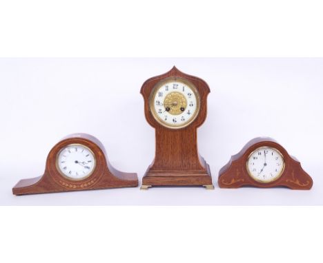 Oak inlaid two train balloon mantel clock, the S. Marti movement striking on a gong, the 4.25" dial within a shaped pointed a
