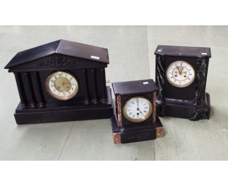 Black slate and green marble two train mantel clock striking on a bell, the 4" white dial enclosing a recessed visible escape