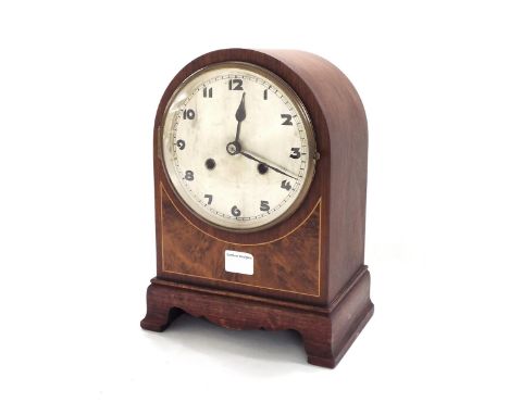 Mahogany two train mantel clock striking on a gong, the 6" silvered dial above a burr walnut panel within a rounded arched st