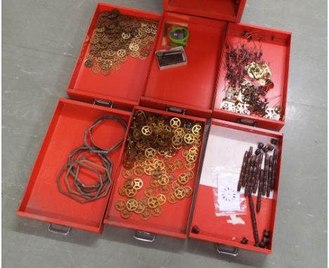 Ten drawer steel chest containing watch and clocks spares including watch spring winders, pinion wire parts, tools and wheels