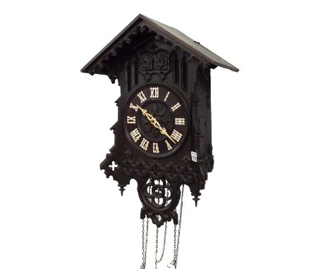 Black Forest cuckoo and quail three train wall clock, with wooden plated movement, the 7.5" wooden dial within a chalet style