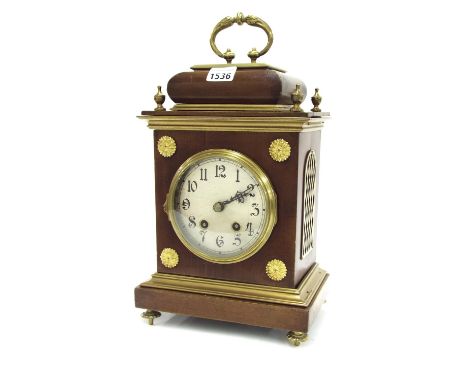 English mahogany two train mantel clock, the Astral movement striking on a bell, the 4.75" silvered dial within a stepped orm