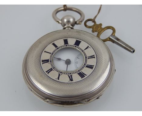 A 19th century white metal half hunter pocket watch, Swiss cylinder movement, the enamel dial with Roman numerals, subsidiary