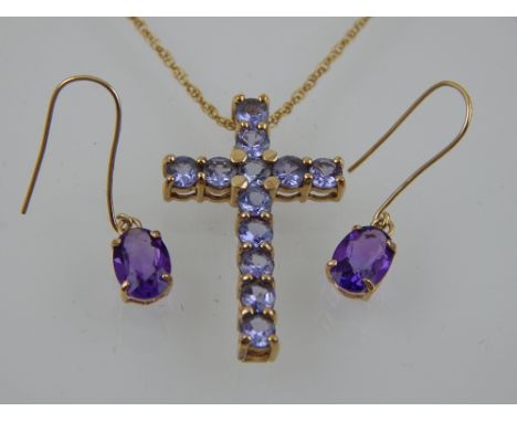 A 9ct yellow gold amethyst crucifix pendant, on chain, together with a pair of 9ct amethyst earrings.