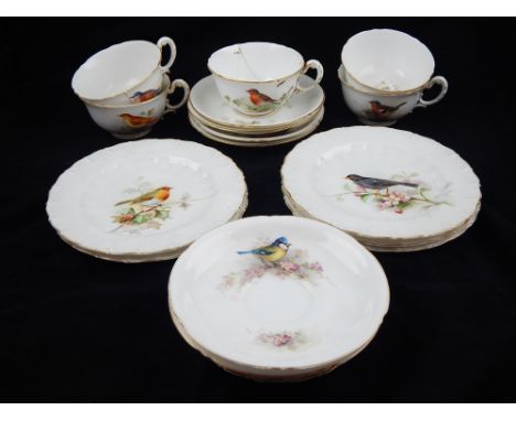 A Royal Worcester part tea service, decorated with British garden birds by William Powell, (18).