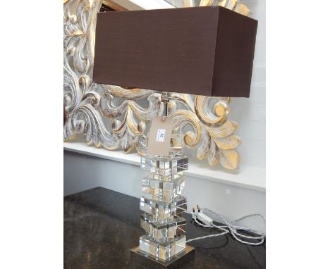 A Modern designer glass table lamp and shade, the square block column on chrome foot. H. 50cm