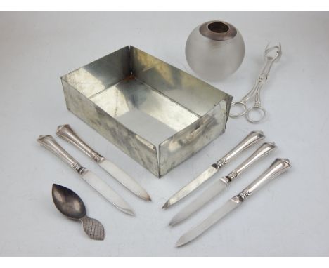 A Victorian silver mounted glass match striker together with a continental silver caddy spoon, five silver handled tea knives