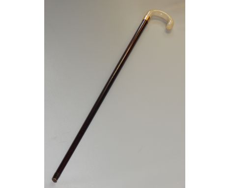 A Victorian / Edwardian gold mounted ivory handled rosewood walking stick.