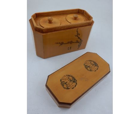 A Japanese fruitwood tea caddy of elongated octagonal form decorated with landscape and blossom with twin lidded interior. 18