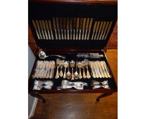 A canteen of silver plated Kings Pattern cutlery, for twelve place settings and including carving set and soup ladle, contain