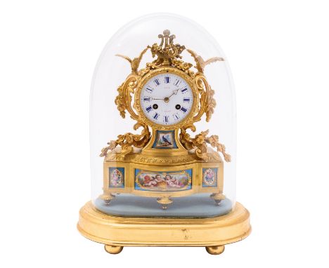 Vincenti et Cie for Dent, a mid-Victorian French ormolu and porcelain mantle clock, the eight-day duration movement striking 