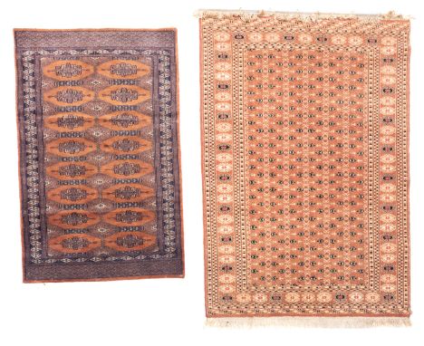 A Pakistan rug, of Turkoman design, the camel field with an all over geometric design, enclosed by a radiating stellar medall