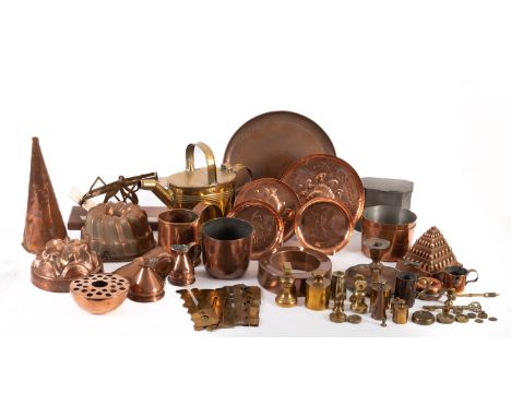 A diverse collection of domestic metalware, predominantly 19th century; including a brass watering can, 23cm high; a pewter t