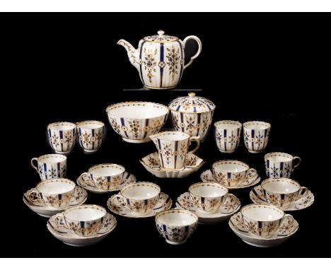 A Caughley porcelain tea service comprising a teapot and cover, milk jug, sucrier and cover, spoon tray, waste bowl, nine tea
