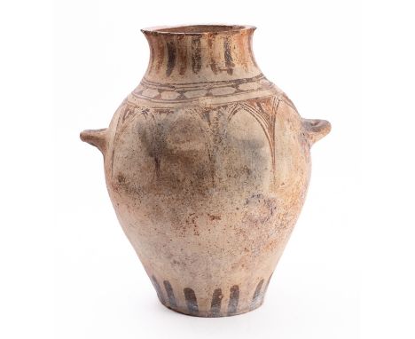 A decorated pottery jar, probably Morrocan, mid 20th century; of ovoid form;the neck probably reduced; the shoulder with a sc