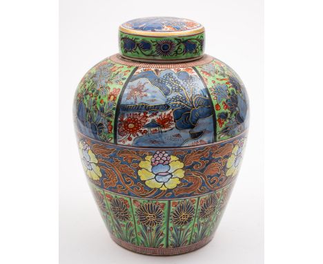 A Chinese blue and white oviform jar and cover with later 'clobbered' polychrome decoration with bands of flowers and foliage