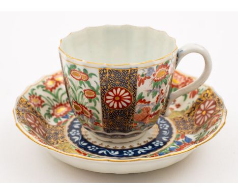 A First Period Worcester fluted coffee cup and saucer decorated in the 'Rich Queen's' Japan pattern within underglaze blue bo