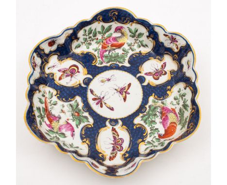 A First Period Worcester teapot stand of lobed hexagonal form, painted with gilt edged catouches of fancy birds and insects r