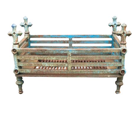 A substantial cast iron basket grate, 20th century and later painted; of rectangular form, with stylised fleurs-de-lys finial
