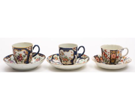 A group of three First Period Worcester coffee cups and saucers the first of fluted form painted in the Imari style with the 