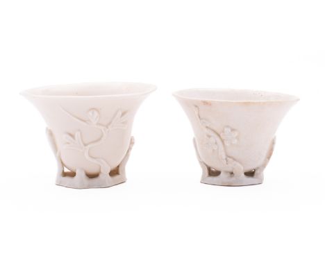 A Chinese blanc de chine prunus libation/wine cup, late17th/18th century, 6cm;  and one other, 6cm [2].