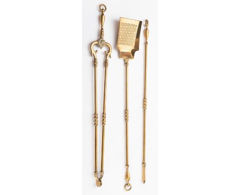 A set of three brass fire tools in George III style, early 20th century; comprising shovel, poker and tongs; the knopped urn 